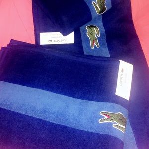 Authentic lacoste bath towel see picture for size.